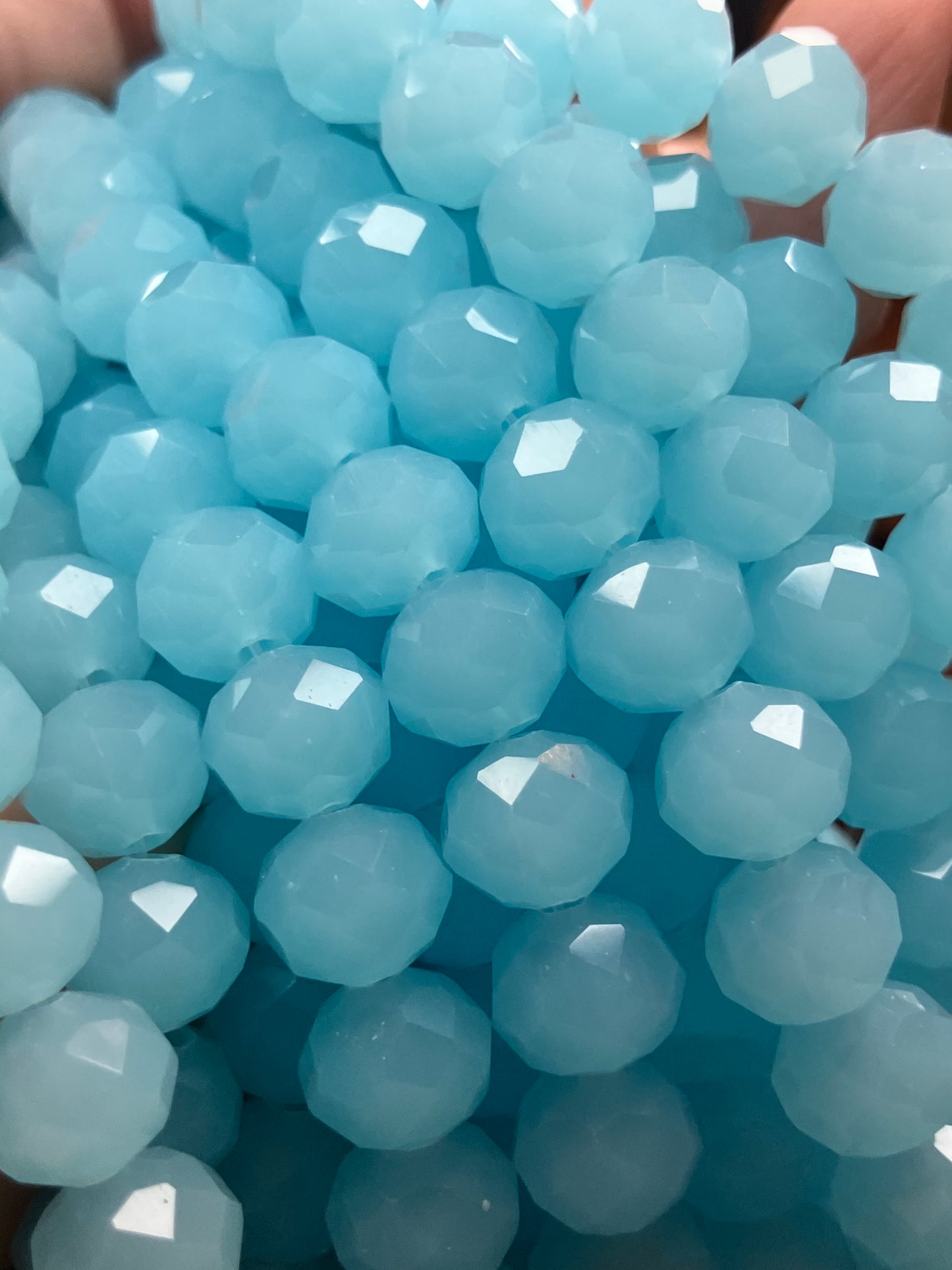 Rondelle faceted light blue 10 mm glass beads