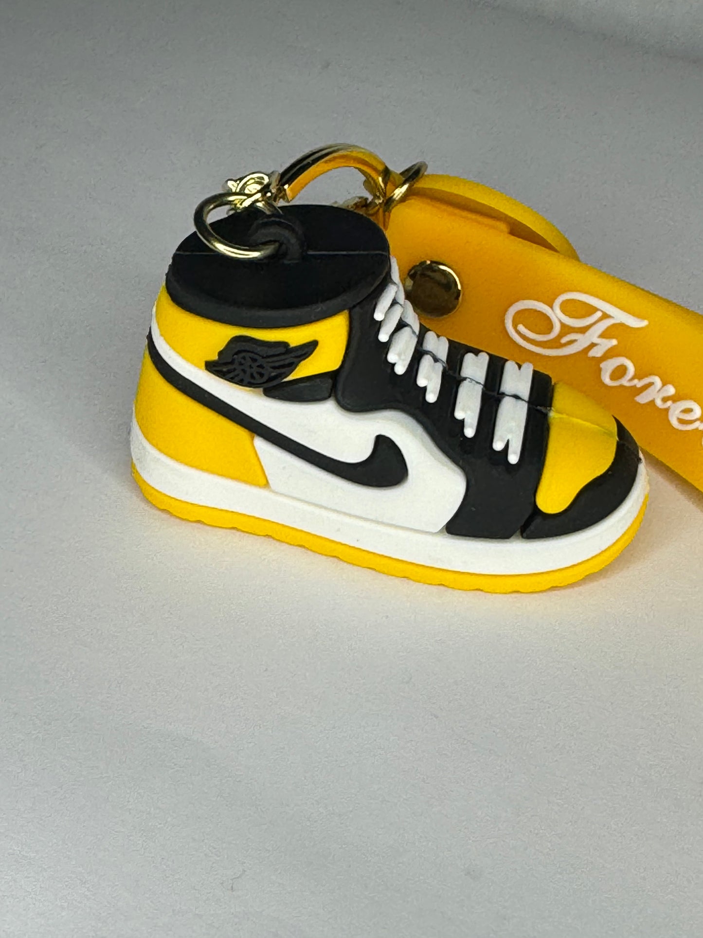  yellow Nike keychain