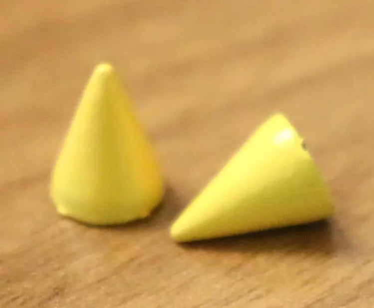 Yellow screw back spikes