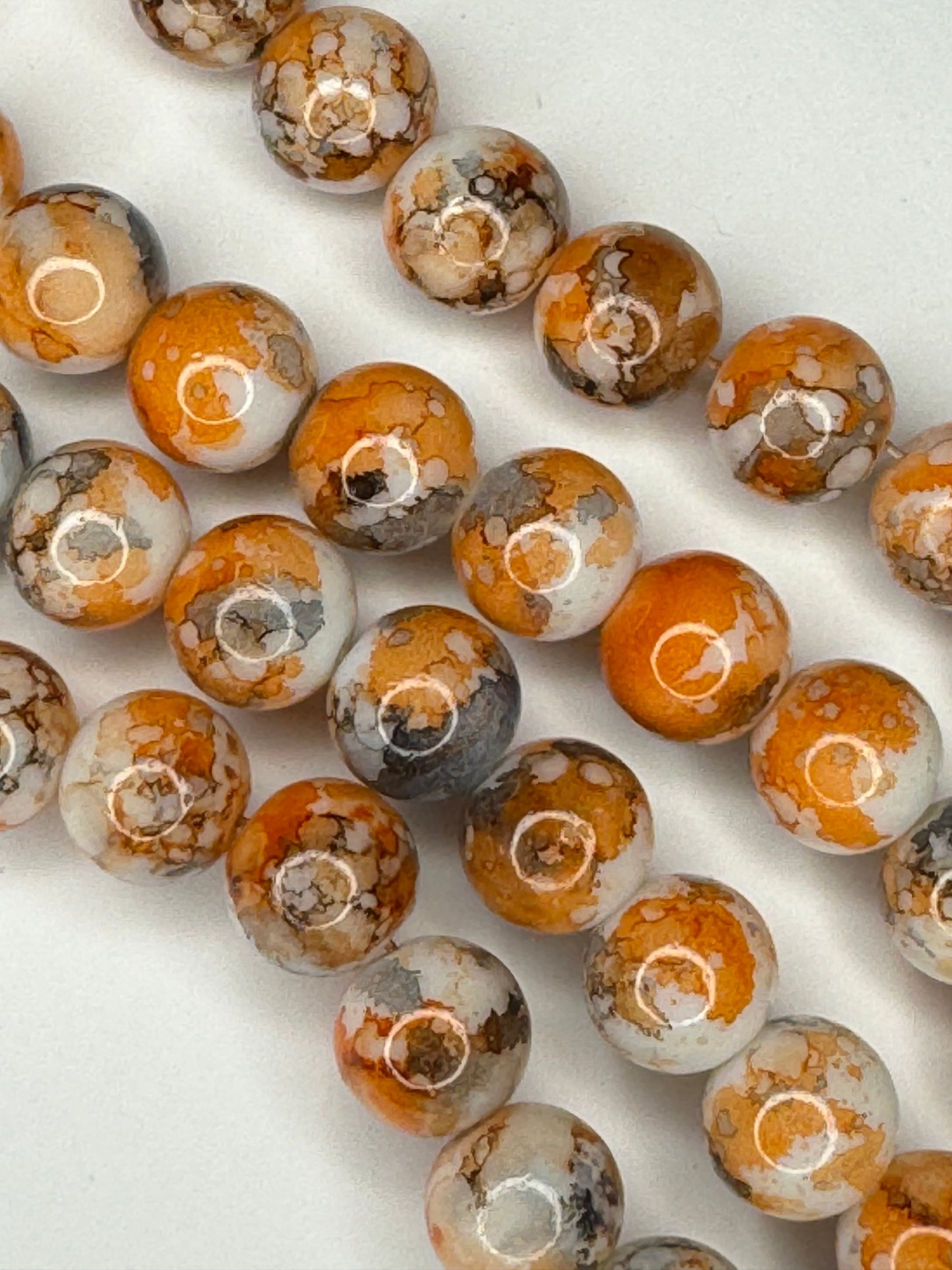 10mm Orange and black glass beads