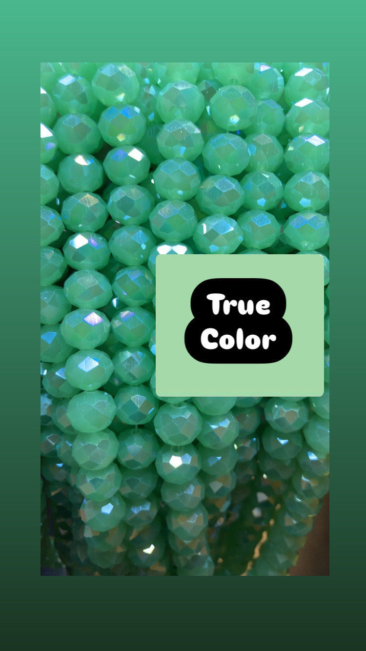 Rondelle faceted light green 10 mm glass beads