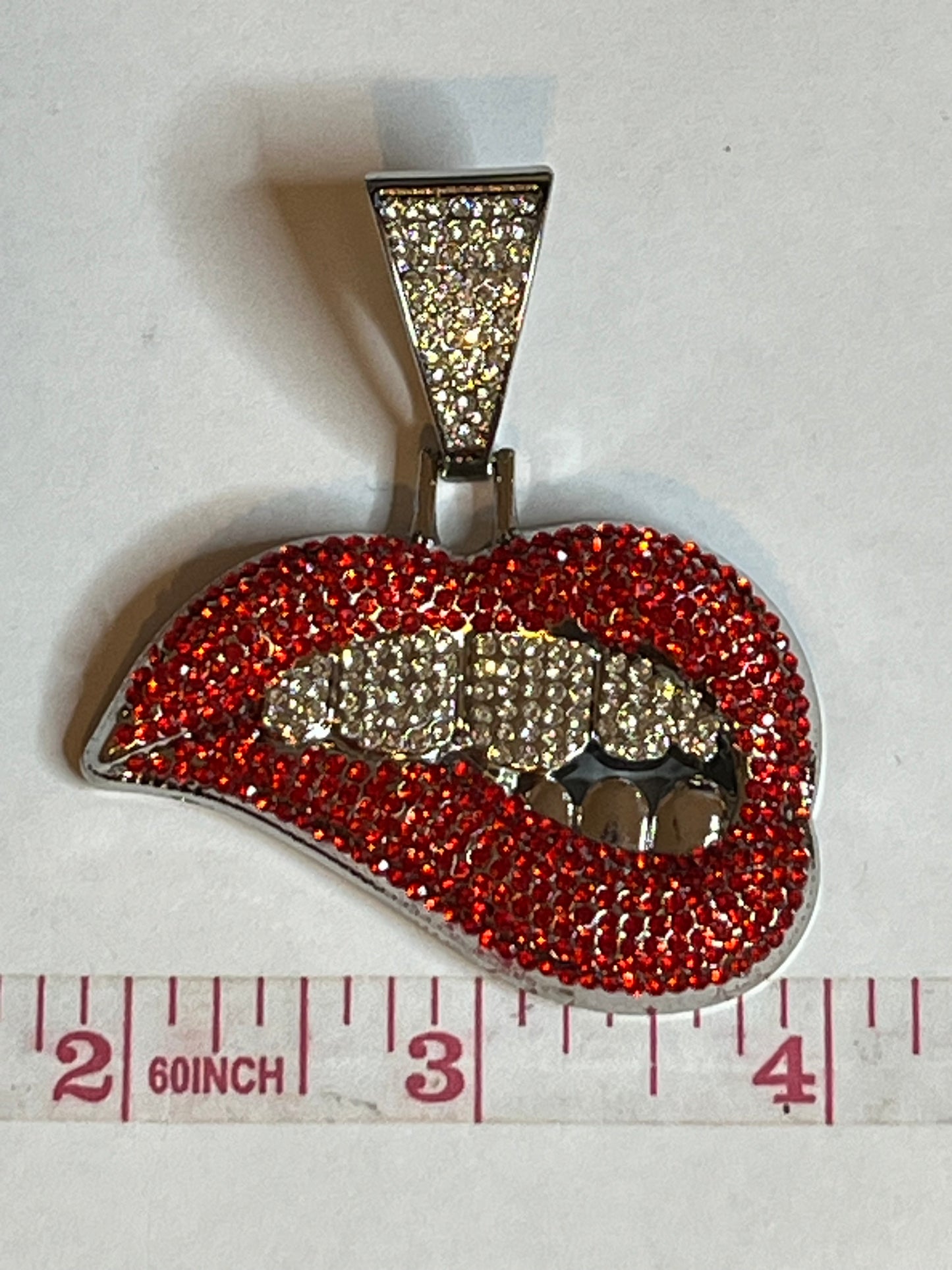Big bling smirk pendant