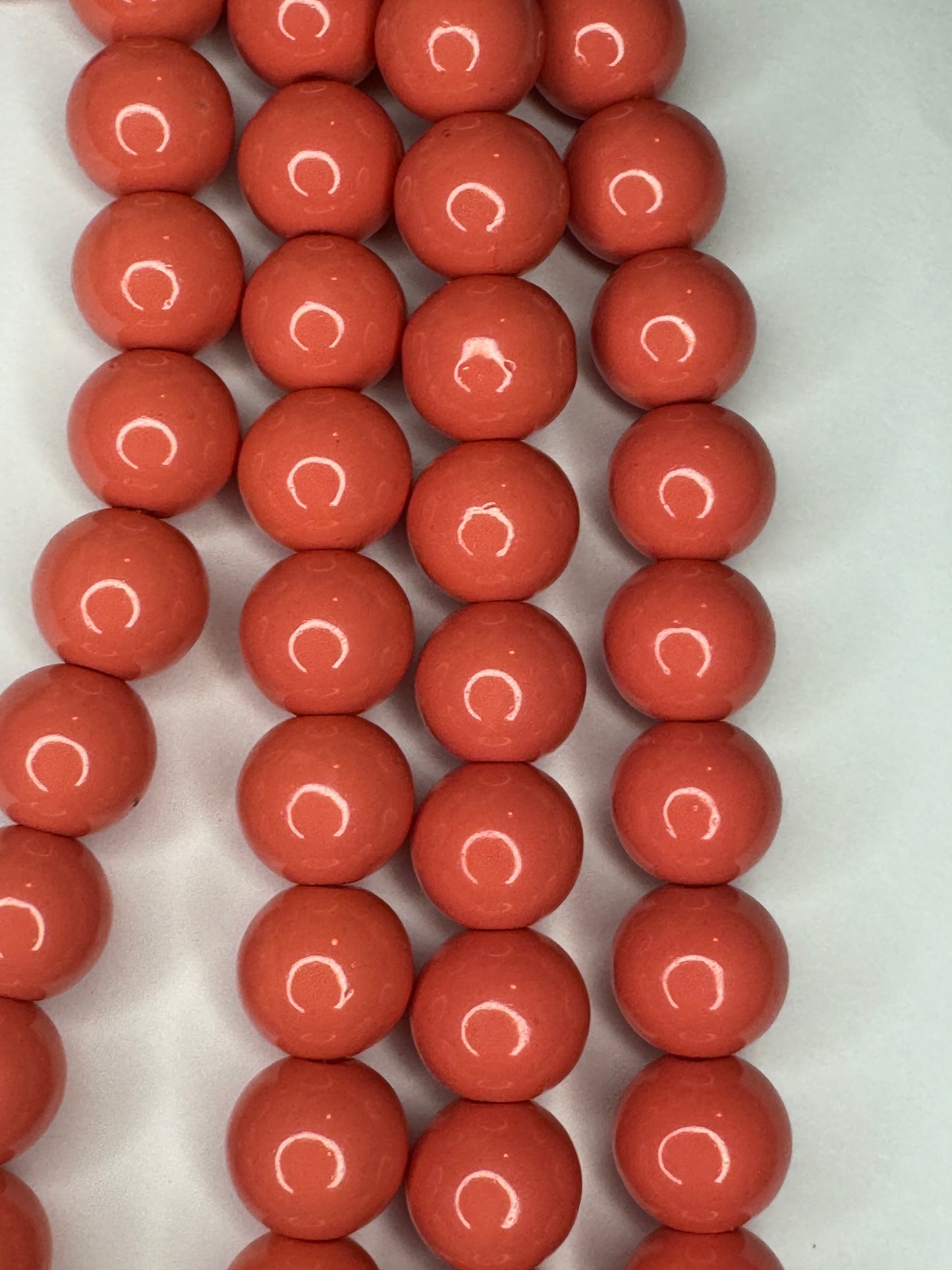 Coral glass beads
