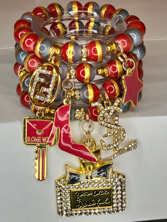 Burgundy and gold 4 piece beaded charm bracelet set