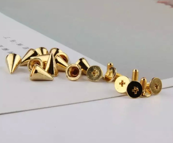 Gold screw back spikes